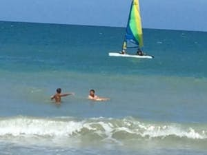 Children swimming on ocean