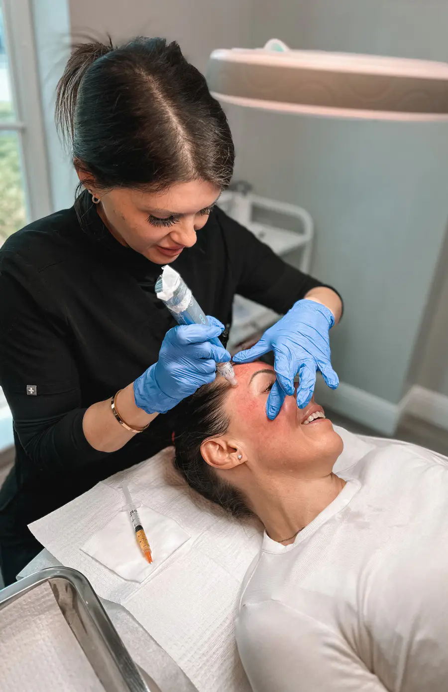 Patient receiving a collagen-induction microneedling treatment at Refresh - Aesthetics & Wellness in Florida Patient receiving a collagen-induction microneedling treatment at Refresh - Aesthetics & Wellness in Florida