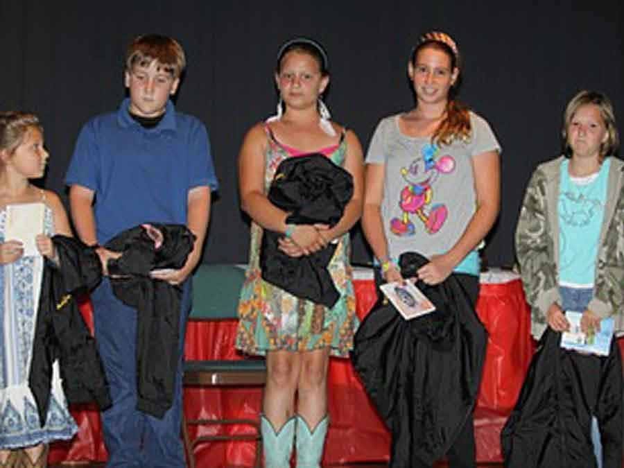 Kids receiving awards at banquet