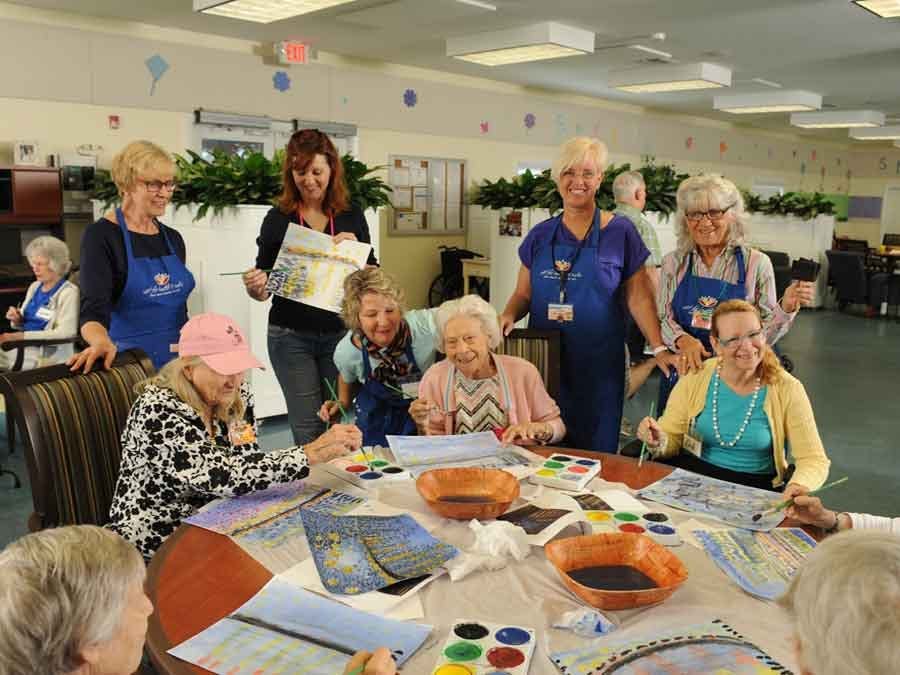 Senior women doing crafts at table