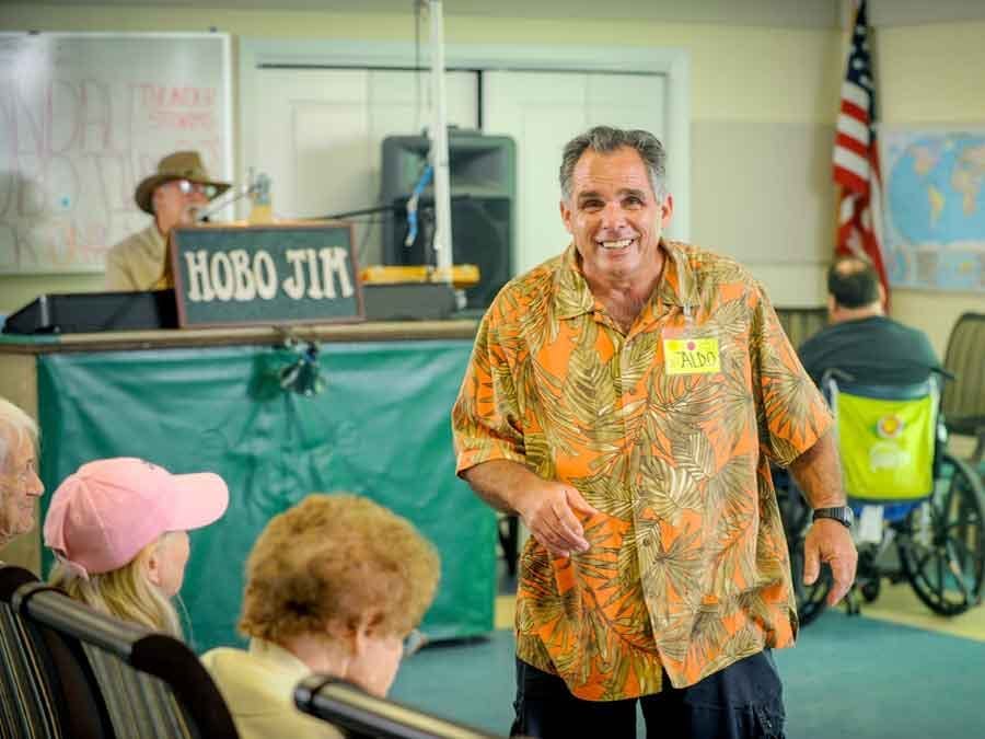 senior man in Hawaiian shirt
