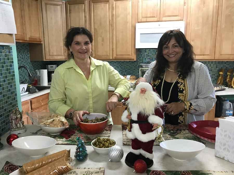 ladies cooking for Christmas party
