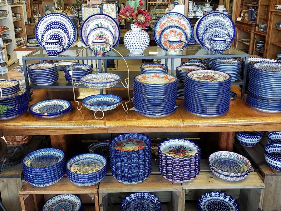 shelves with assorted pottery for sale