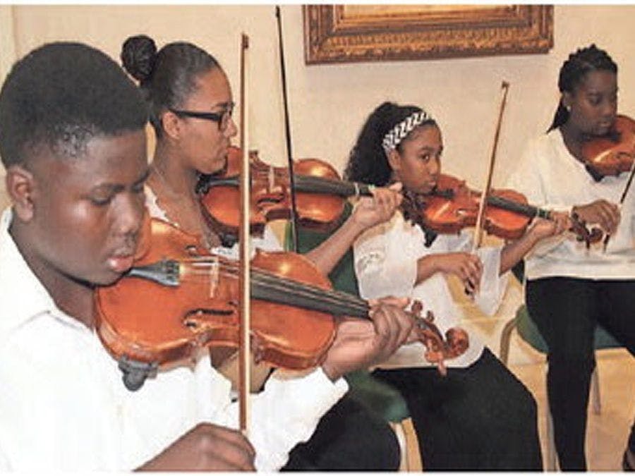 Children playing violins