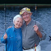 Man and woman with fishing poles