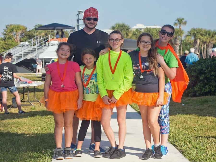 Happy family after finishing the walk