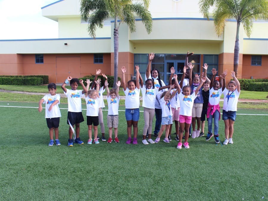Group of kids in front of school