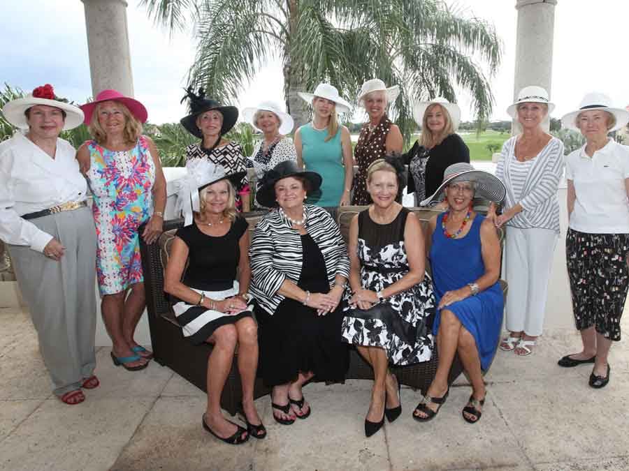 Photo of ladies wearing hats at fundraiser Photo of ladies wearing hats at fundraiser