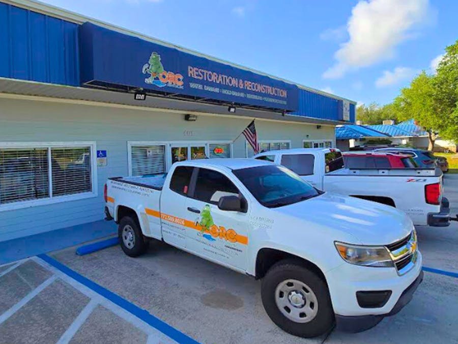 ORC trucks in front of office