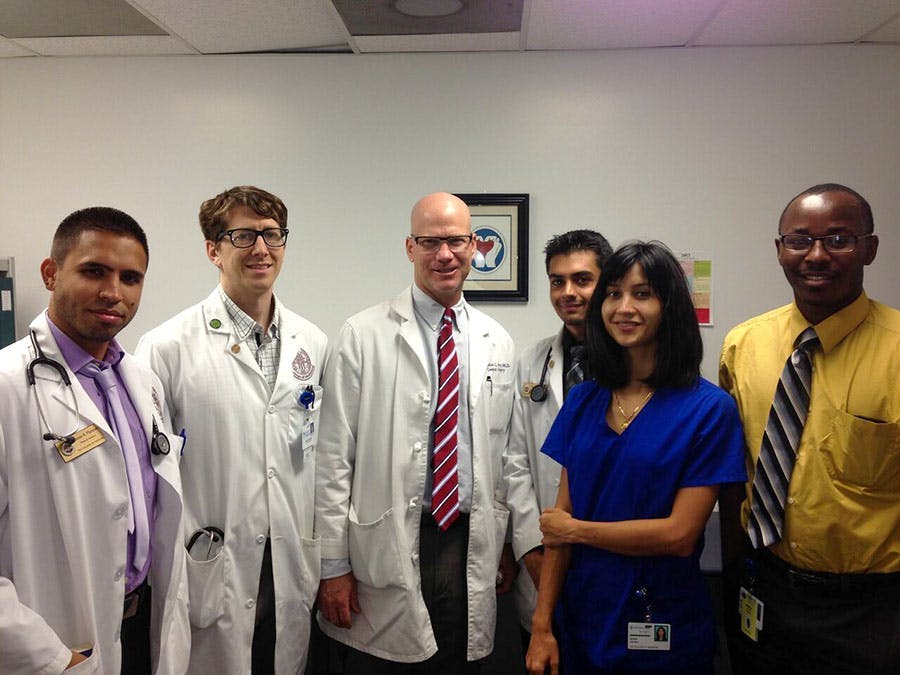 Dr. Perry with volunteers at We Care surgery clinic