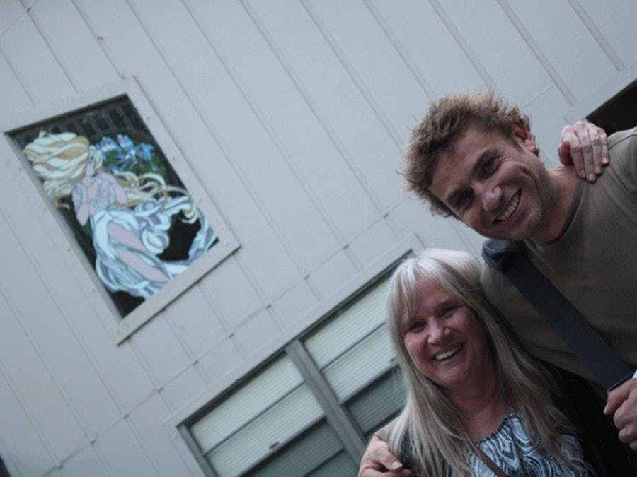 French couple smiling for photo