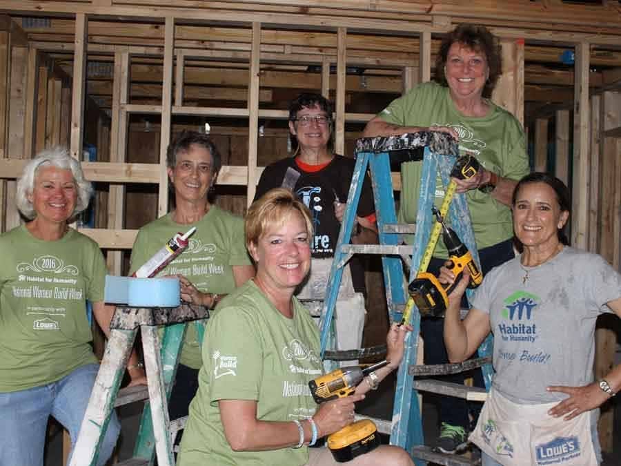 Volunteers working on interior of new home