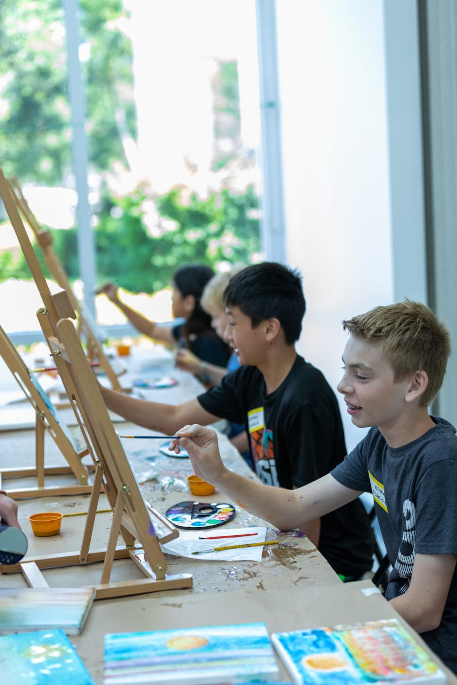 Children painting at VBMA Summer Art Camp